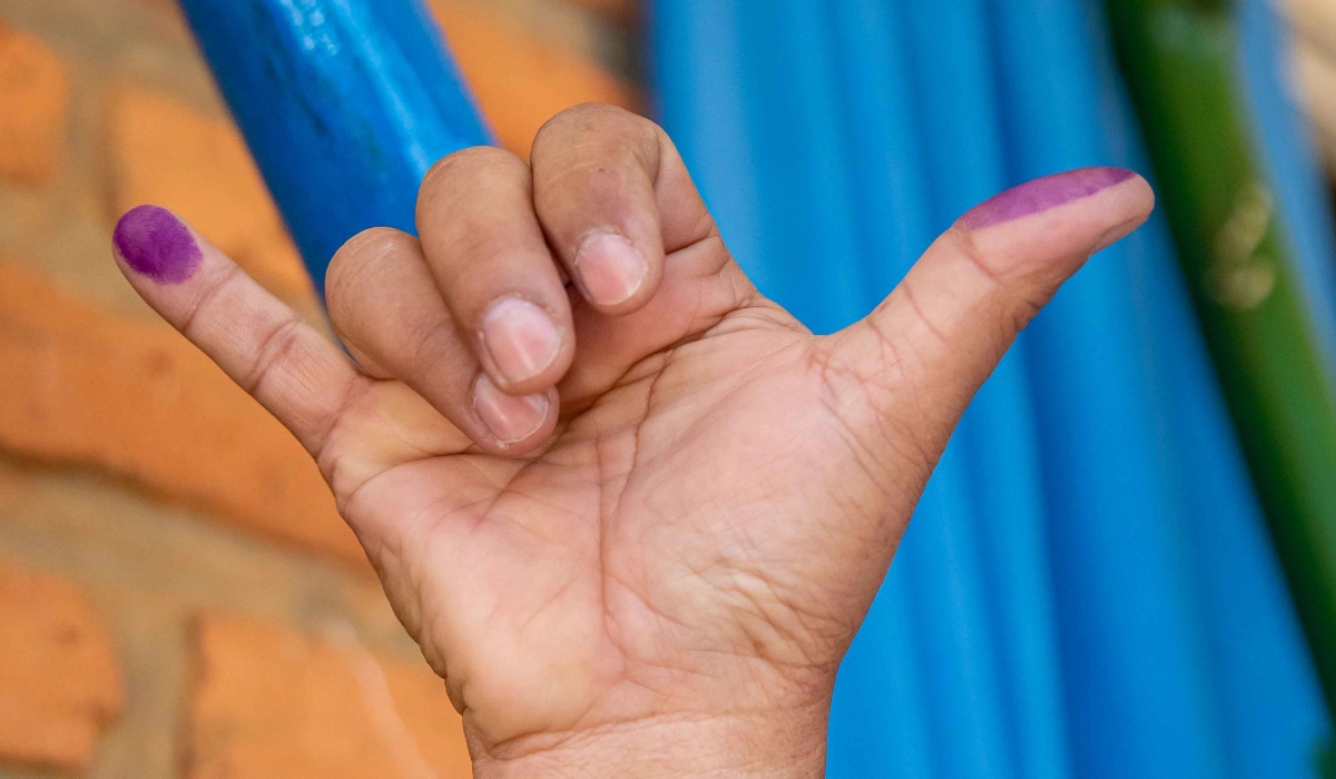 A voter after castiing his vote during the presidential and parliamentary on Monday, July 15. Photo by Dan Gatsinzi