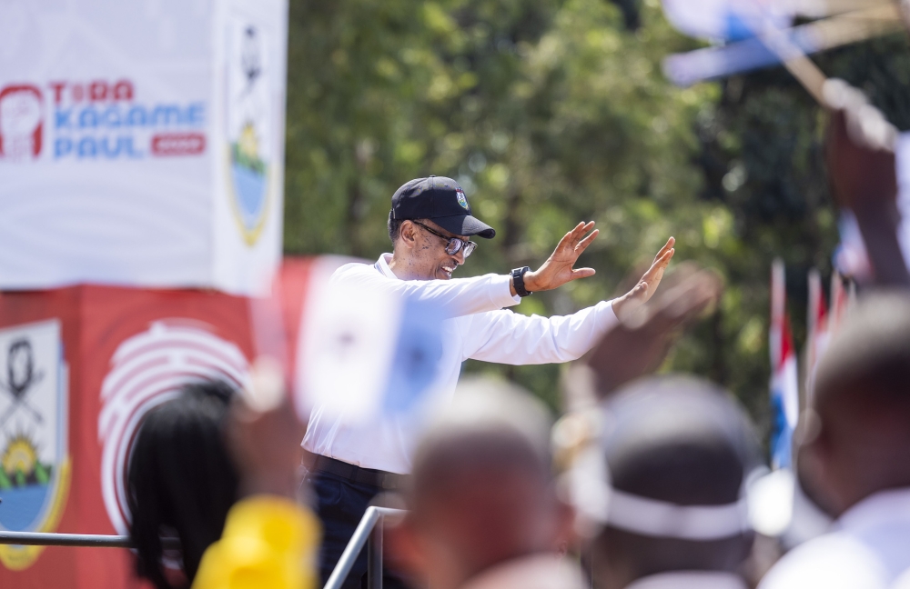 RPFInkotanyi flag bearer Paul Kagame greets thousands  residents during the campaign in Nyamasheke. Paul Kagame secured 99.18 per cent of the votes during the elections. Olivier Mugwiza