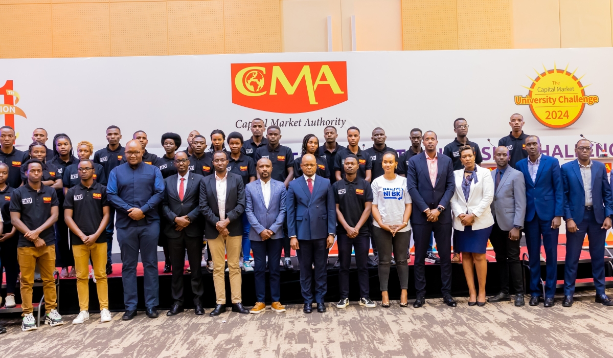 Officials and participants pose for a group photo at the awarding ceremony.