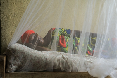 A woman sleeping under a mosquito net in Mareba sector in Bugesera district. Photo: File.