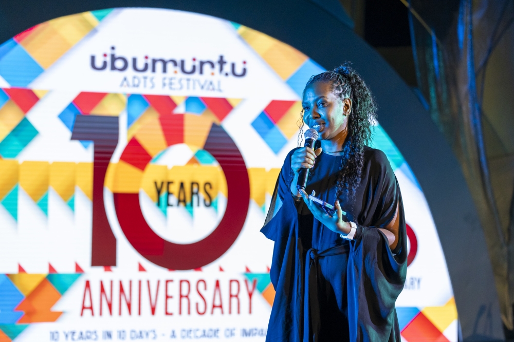 Hope Azeda addresses revelers who turned up for Ubumuntu Arts Festival at Kigali Genocide Memorial. Olivier Mugwiza