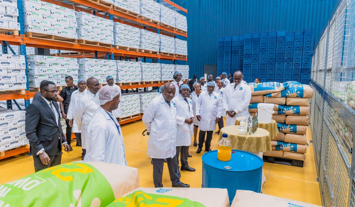 PM Ngirente and officials tour the new plant that will produce 41 tonnes of milk powder, 25.6 tonnes of butter, and 11.3 tonnes of ghee per day. courtesy