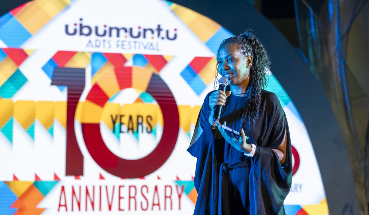 Hope Azeda addresses revelers who turned up for Ubumuntu Arts Festival at Kigali Genocide Memorial. Olivier Mugwiza