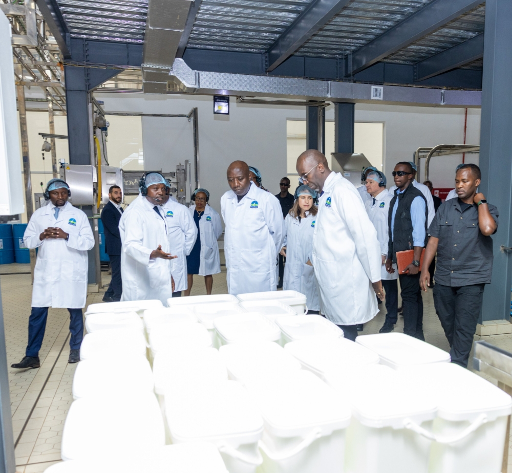 James Kagaba, the Managing Director of Inyange Milk Powder Plant, gives Prime Minister Edouard Ngirente insights into operations at the plant as Ildephonse Musafiri, the Minister of Agriculture and Animal Resources (left) and Jean-Claude Karayenzi, the Executive Chairman of Crystal Ventures Ltd (Right), look on during a guided tour of Rwanda’s first milk powder factory in Nyagatare District, on Wednesday, July 24. Courtesy