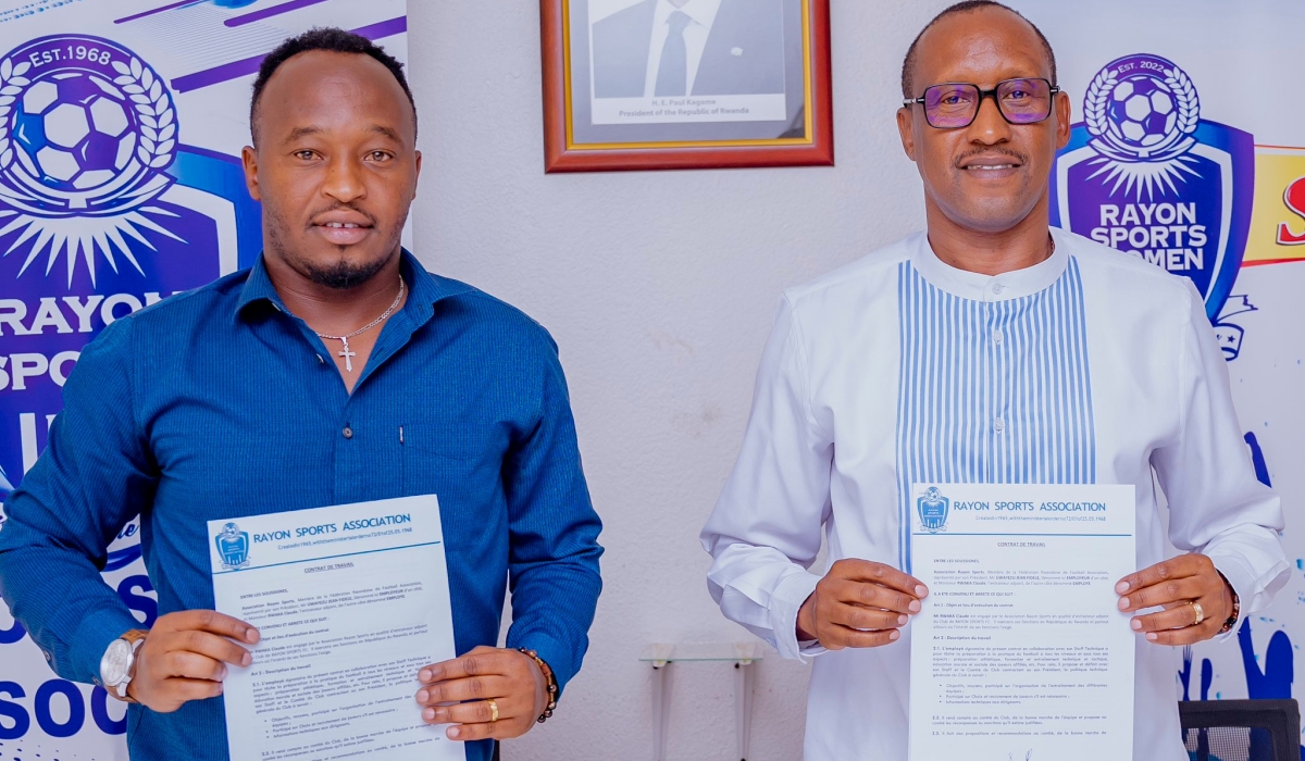 Rayon Sports Women head coach Claude Rwaka and the club president Nduwayezu after signing the agreement for extending his contract. Courtesy