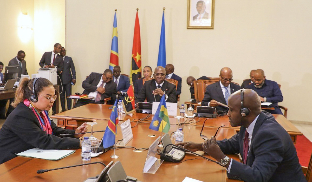 Rwanda&#039;s Minister of Foreign Affairs and International Cooperation, Olivier Nduhungirehe (R), and Therese Kayikwamba Wagner, DR Congo’s Minister of Foreign Affairs during the second ministerial meeting on the security and peace situation in eastern DR Congo in Luanda, Angola, on Tuesday, July 30. The bilateral meeting was chaired by Angola&#039;s Minister of Foreign Affairs, Tete Antonio who was a mediator. Courtesy