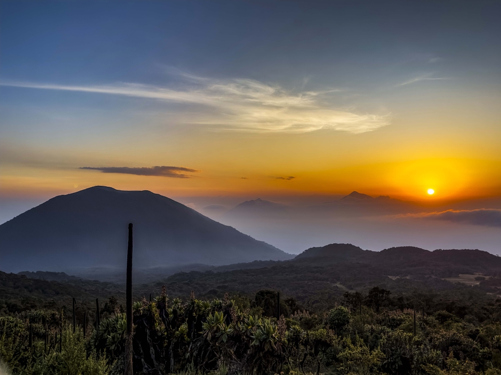 A landscape view of the sunrise, captured from the campsite during our hike to Karisimbi volcano. Courtesy