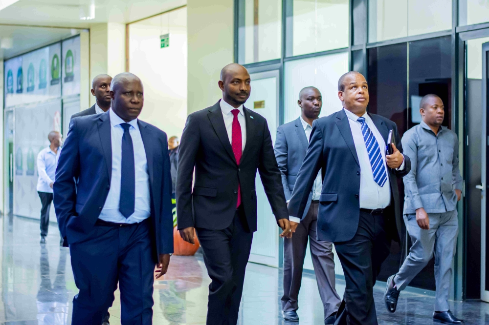 The Judge President of the East African Court of Justice, Justice Nestor Kayobera (left), the Chief Justice of Somalia, Bashe Yusuf Ahmed (centre) and EACJ Principal Judge Yohanne Masara at the EAC Headquarters in Arusha, Tanzania.