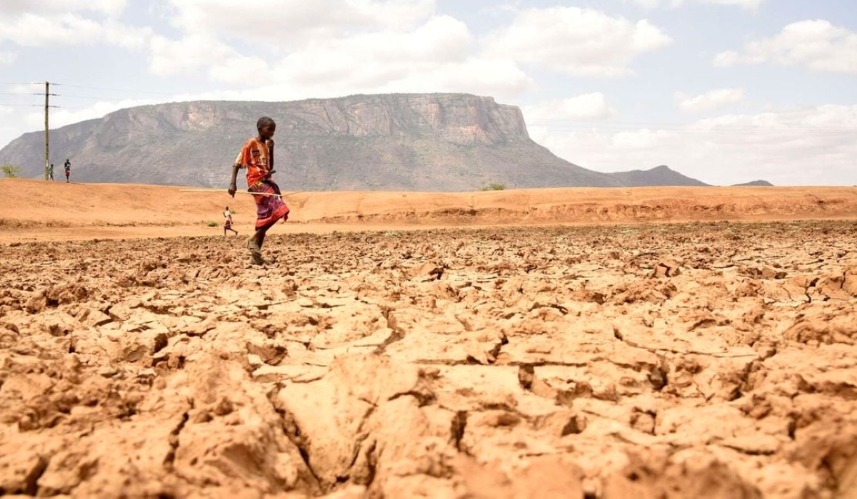 A herdsboy walks on a dry land in Samburu County, Kenya on July 15,2021.