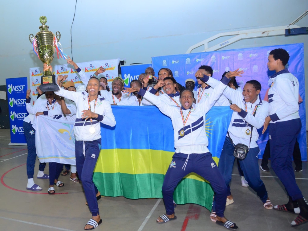 RRA  volleyball club players celebrate the victory as after winning the Kampala Amateur Volleyball Club (KAVC) tournament , on Sunday, August 3. Courtesy