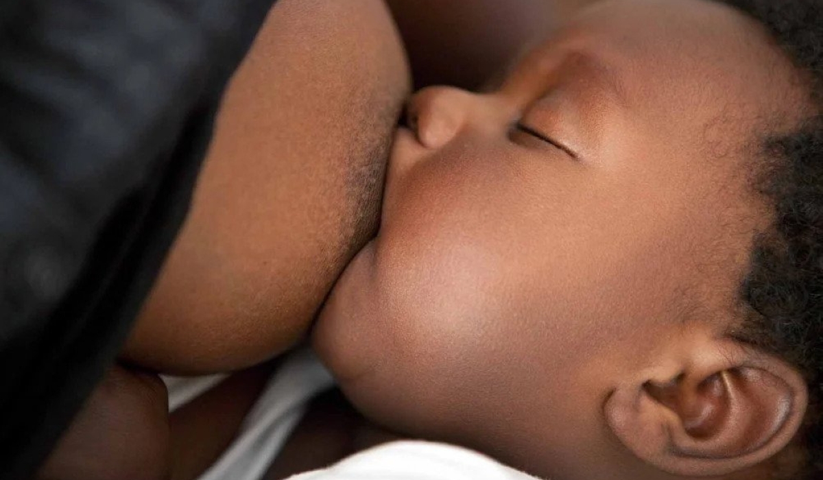 A woman breastfeeding her baby. The new changes aimed to ensure that a newborn child receives adequate care and that the mother has sufficient time to recover and regain strength. File