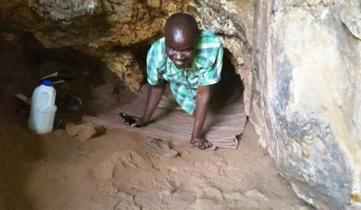 A believer praying from a cave. At least 100 &#039;church caves&#039; have been shut down in the ongoing crackdown, according to Rwanda Governance Board.