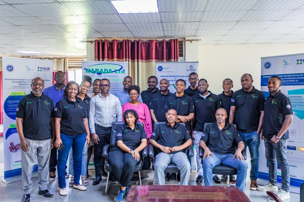 Participants and officials pose for a group photo during the workshop on the project in Kigali on Wednesday, August 7. The project was entitled “Development of a Smart Wearable Device for Real-Time Risk Monitoring of Infectious Virus Spreading Case Study of COVID-19”. All photos by Craish Bahizi