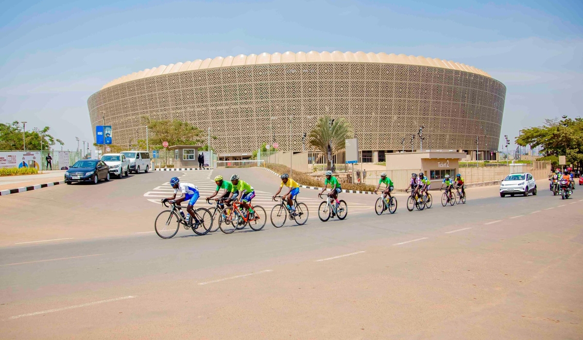 A group of riders in a breakaway near the newly revamped Amahoro Stadium  during the  Rwanda Junior Tour 2024 Cycling Championship. Ferwacy announced that Rwanda Championship will take place on 17-18 August.