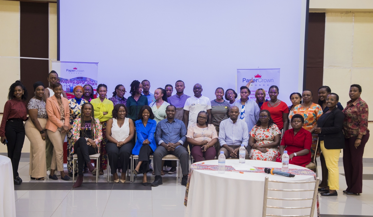 Officials and participants pose for a group photo during a recent workshop in Kigali. Craish Bahizi