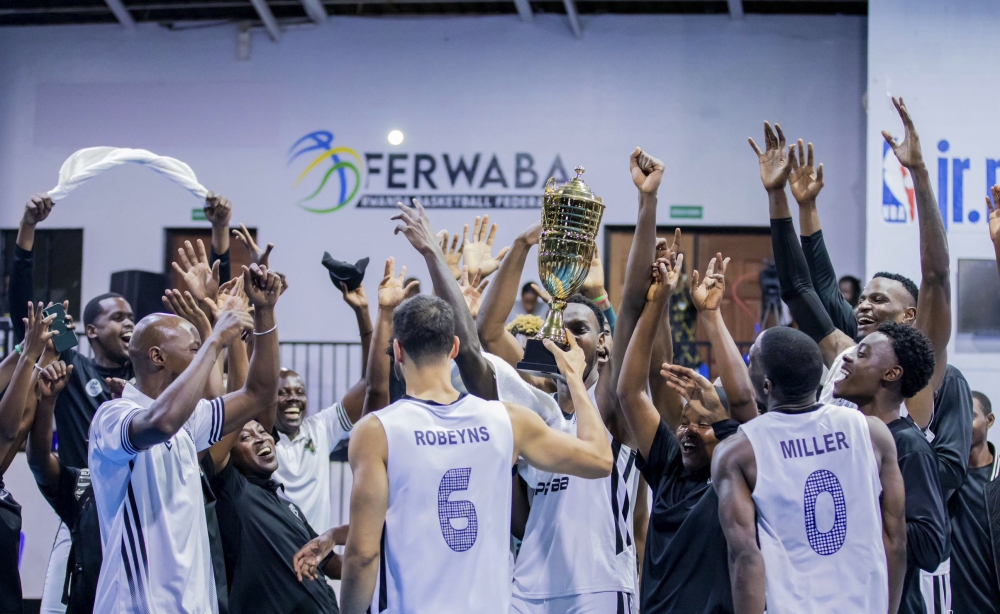 APR BBC players celebrate the victory after stunning REG 110-92 in the final of the inaugural Rwanda Cup on Friday night at Lycée de Kigali Gymnasium. Photos by Steven Mugenzi