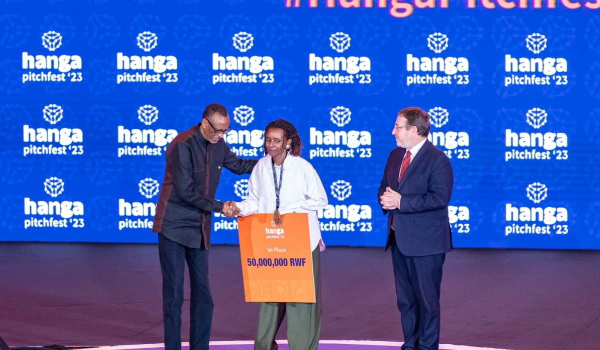 President Paul Kagame congratulates and awards Cynthia Umutoniwabo, the Chief Executive and Founder of Loopa, who was the overall winner of Rwanda&#039;s largest startup competition, on Friday, December 8, 2023. Photo by Dan Gatsinzi