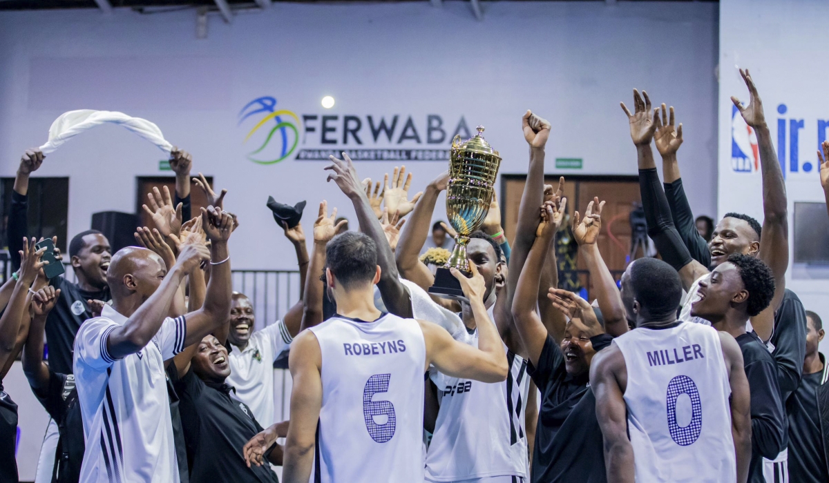 APR BBC players celebrate the victory after stunning REG 110-92 in the final of the inaugural Rwanda Cup on Friday night at Lycée de Kigali Gymnasium. Photos by Steven Mugenzi