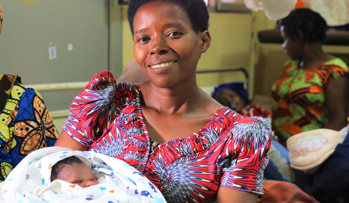 A woman with her newborn at Kacyiru Hospital. Photo by  Craish Bahizi