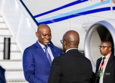 President of Gabon, Brice Oligui Nguema interacts with Minister of Foreign Affairs Olivier Nduhungirehe on his arrival at Kigali International Airport on Saturday, August 10. Photo by Steven Mugenzi