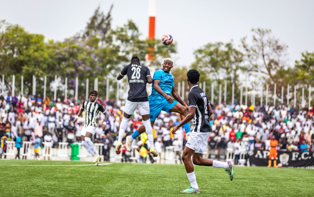 Police FC striker Ani jumps to try aheader during Super Cup final