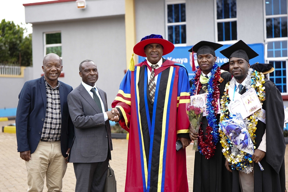  Prof. Simon Gicharu appreciates Bisimwa Bahagare Jean, a parent from the Democratic Republic of Congo (DRC), who attended the graduation of his son, Mulindwa Bahagare (first on the right), along with his friend, Iragi Cibalonza Alain, in Thika, Kenya. Also present was  Henry Musisi, the Director of Corporate Communications and Marketing. The two students graduated from the School of Business in Rwanda.