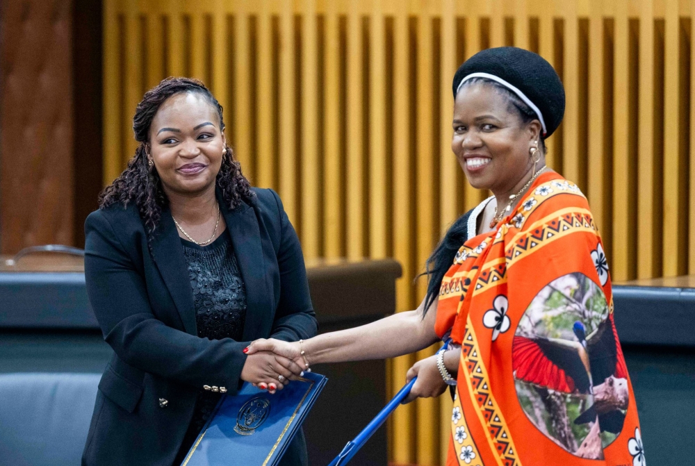 Clementine Mukeka, Permanent Secretary in the Ministry of Foreign Affairs, and Her Royal Highness Princess Lindiwe, Eswatini Minister of Home Affairs, sign an agreement on visa exemption for holders of diplomatic and service passports. PHOTO: VILLAGE URUGWIRO