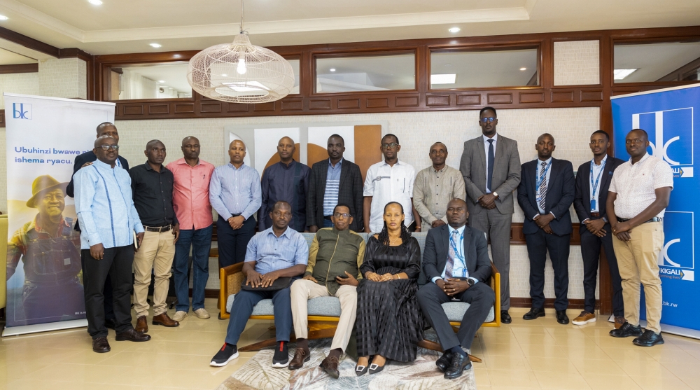 Delegates pose for a group photo after the roundtable talks in Kigali