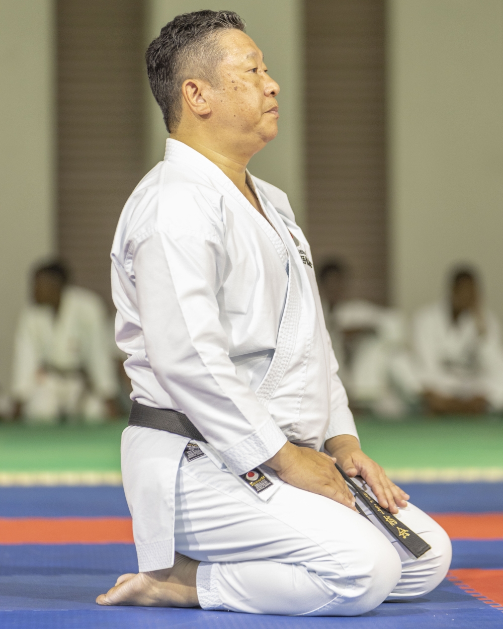 Masaru Kamino&#039;s son, Takahiro Kamino (6th Dan), readies to start the fifth edition of the JKA-Rwanda technical seminar in Kigali on Wednesday, August 14. During Wednesday&#039;s training session, master Takahiro focused on the children, teaching and refining Kata Bassai Dai.