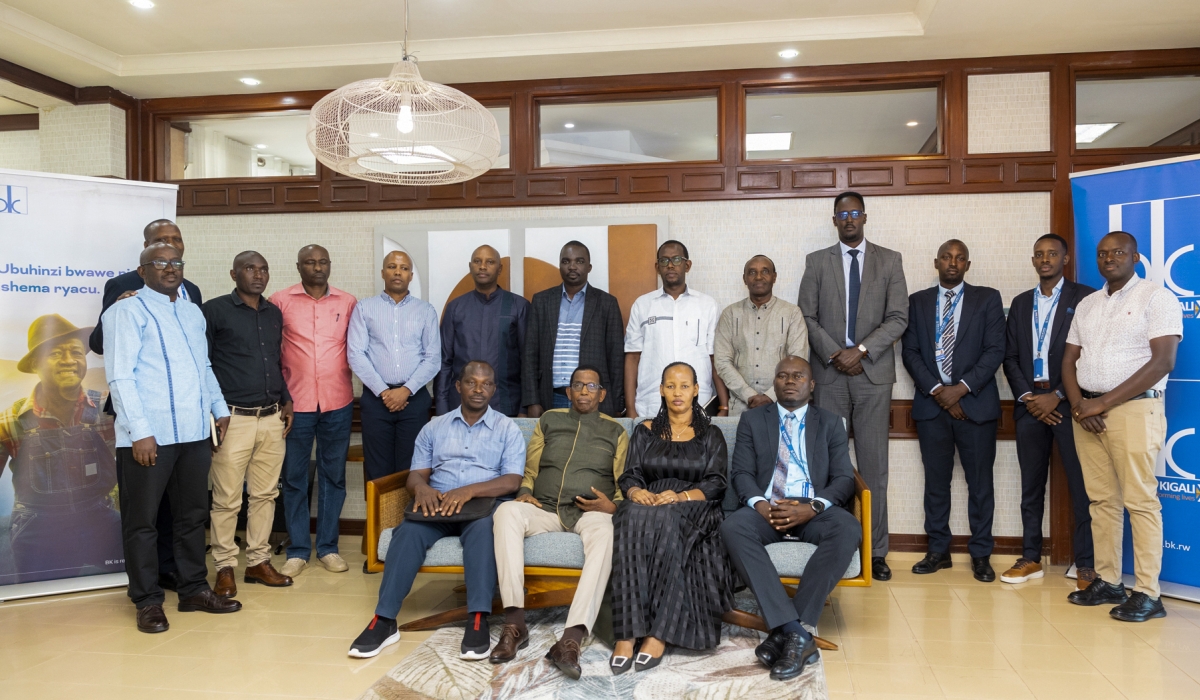 Delegates pose for a group photo after the roundtable talks in Kigali