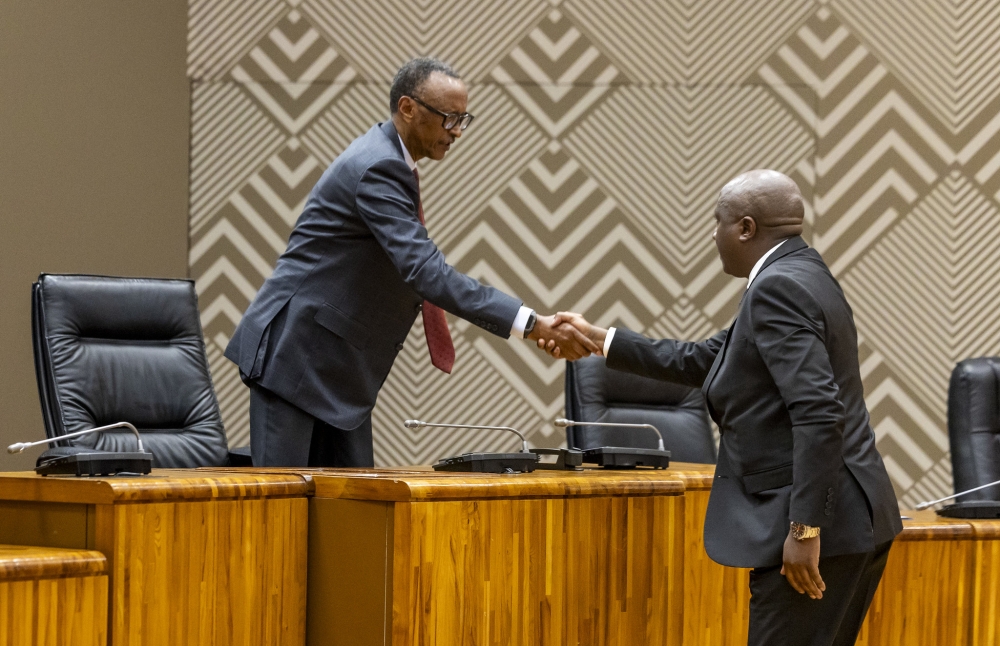 President Paul Kagame welcomes Prime Minister Edouard Ngirente after taking oath of office. PM Ngirente who was reappointed by President Paul Kagame,  took oath on Wednesday, August 14, coinciding with the swearing-in of new members of parliament. Photo by Olivier Mugwiza