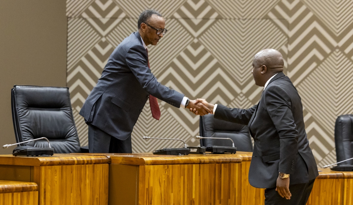 President Paul Kagame welcomes Prime Minister Edouard Ngirente after taking oath of office. PM Ngirente who was reappointed by President Paul Kagame,  took oath on Wednesday, August 14, coinciding with the swearing-in of new members of parliament. Photo by Olivier Mugwiza