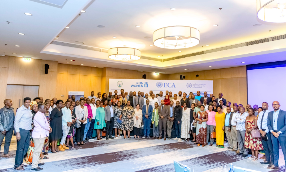 Participants and the officials pose for a group photo during the workshop on August 14.