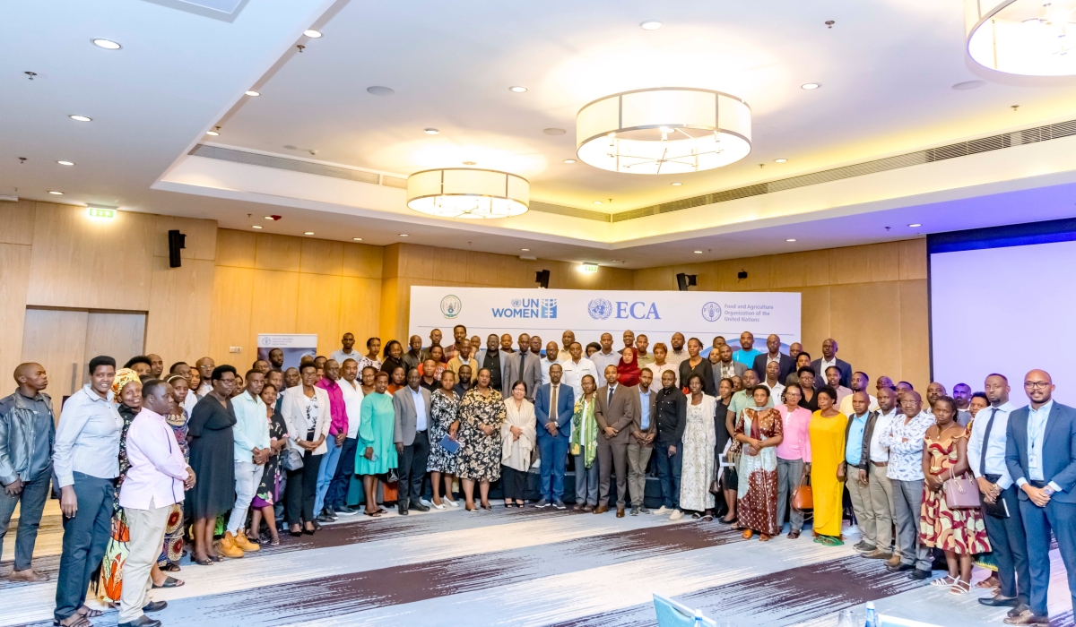 Participants and the officials pose for a group photo during the workshop on August 14.