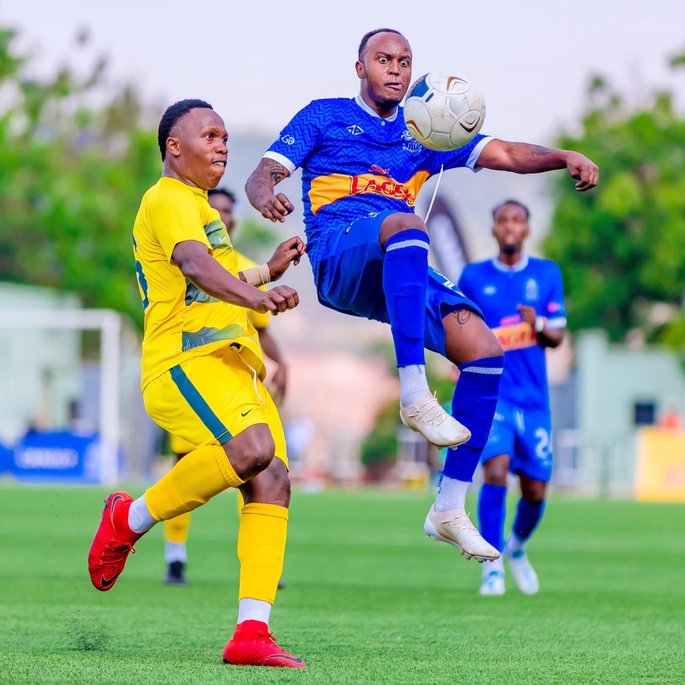 Rayon Sports midfielder Olivier Niyonzima wins the ball against Marine FC defender during a goalless draw at Kigali Pele Stadium on Saturday. Courtesy