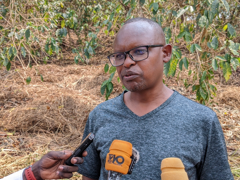 Eric Kabayiza, Single Project Implementation Unit (SPIU) Coordinator, speaks to journalists on replacement of aging coffee trees in Nyamasheke district. Photos By Germain Nsanzimana 