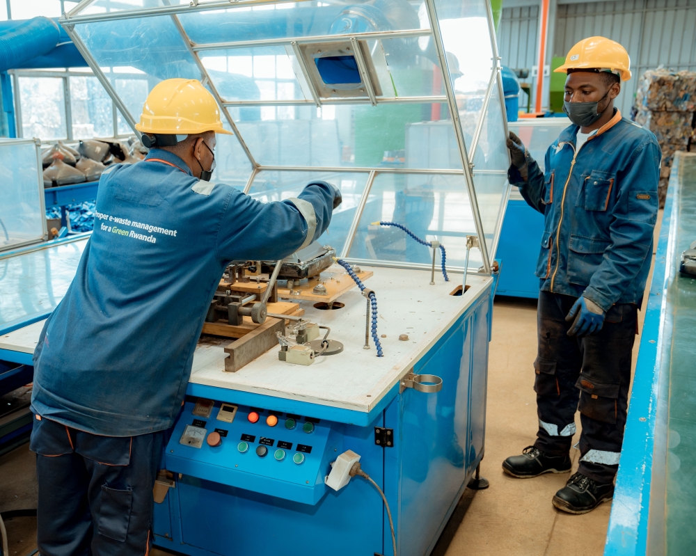 Workers on duty at Enviroserve Rwanda e-waste dismantling and sorting facility. Photo: File.