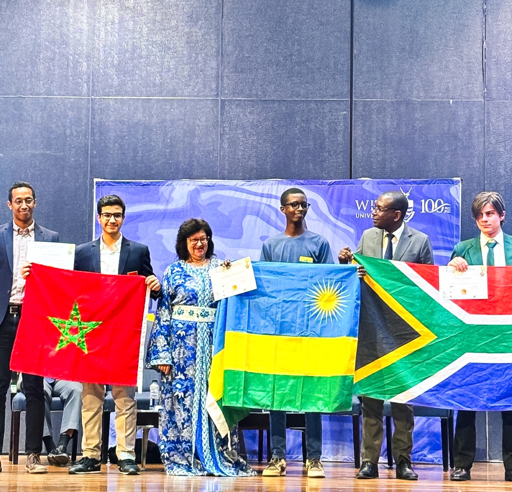 Rwandan student Denys Prince Tuyisenge (C), the winner of a gold medal. Tuyisenge is one of six students on the Rwandan team that participated in the competition. Courtesy