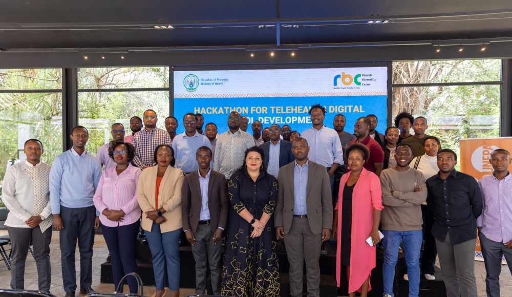 Officials and participants pose for a group photo at the event at Norrsken in Kigali.