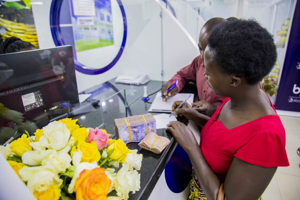 Clients at BPR Rwanda Nyabugogo branch. The National Bank of Rwanda reduced its benchmark interest rate, known as the central bank policy rate, by 50 basis points to 6.5%.