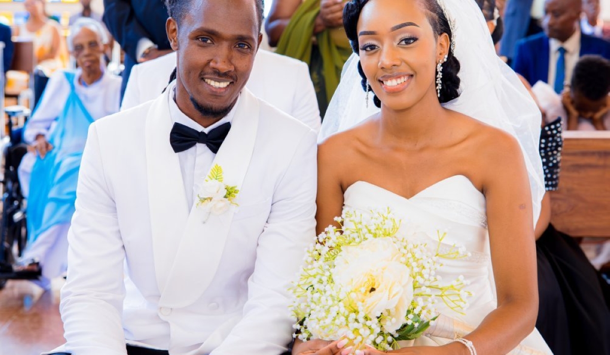 Odile Sangwa and Shyaka radiate pure joy as they celebrate their wedding day.