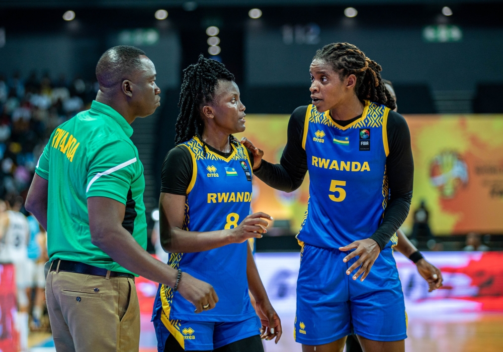 Head coach Cheikh Sarr and players during the game against Argentina on Wednesday, August 21. Dan Gatsinzi