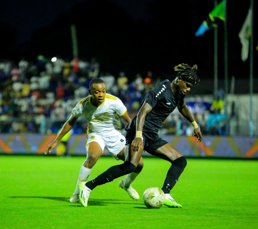 APR FC&#039;s Clement Niyigena  wins the balll against AZAM FC players during 0-1 game in Tanzania on Sunday, August 18. Courtesy