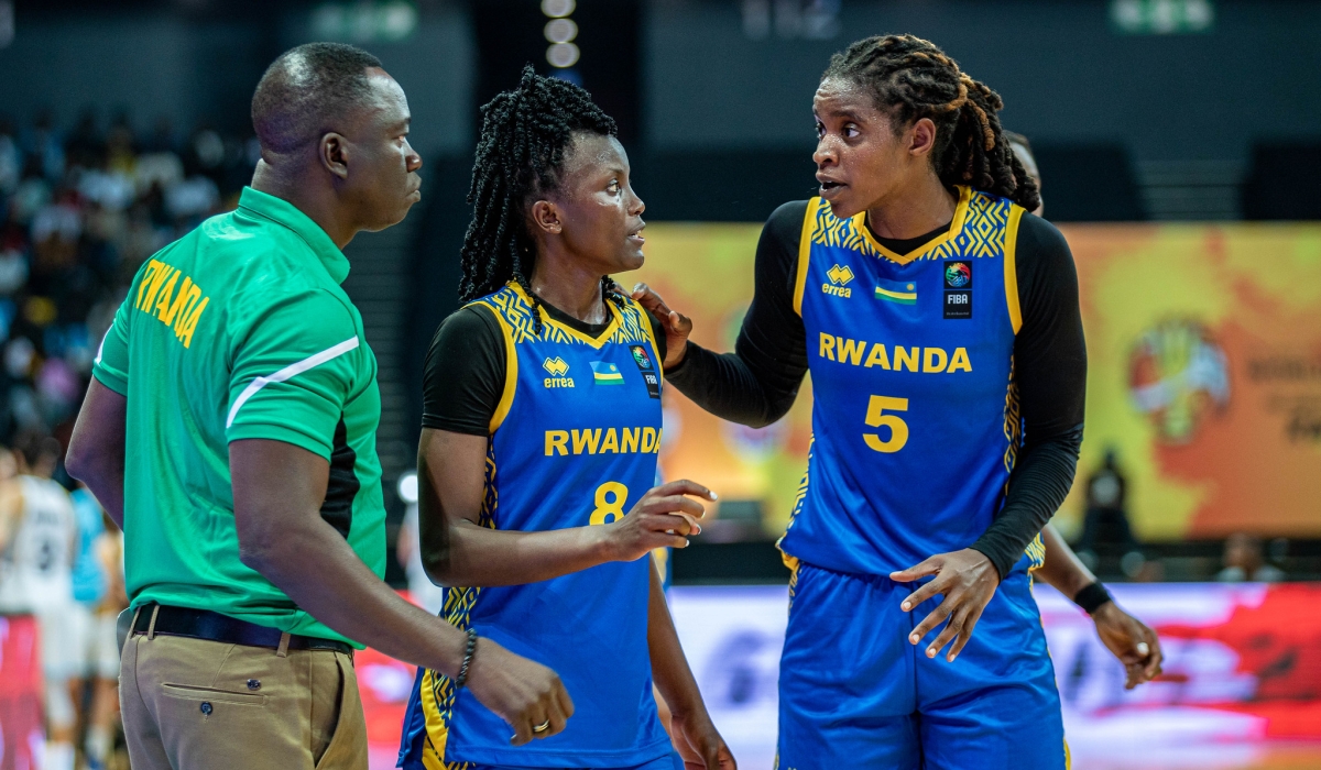 Head coach Cheikh Sarr and players during the game against Argentina on Wednesday, August 21. Dan Gatsinzi