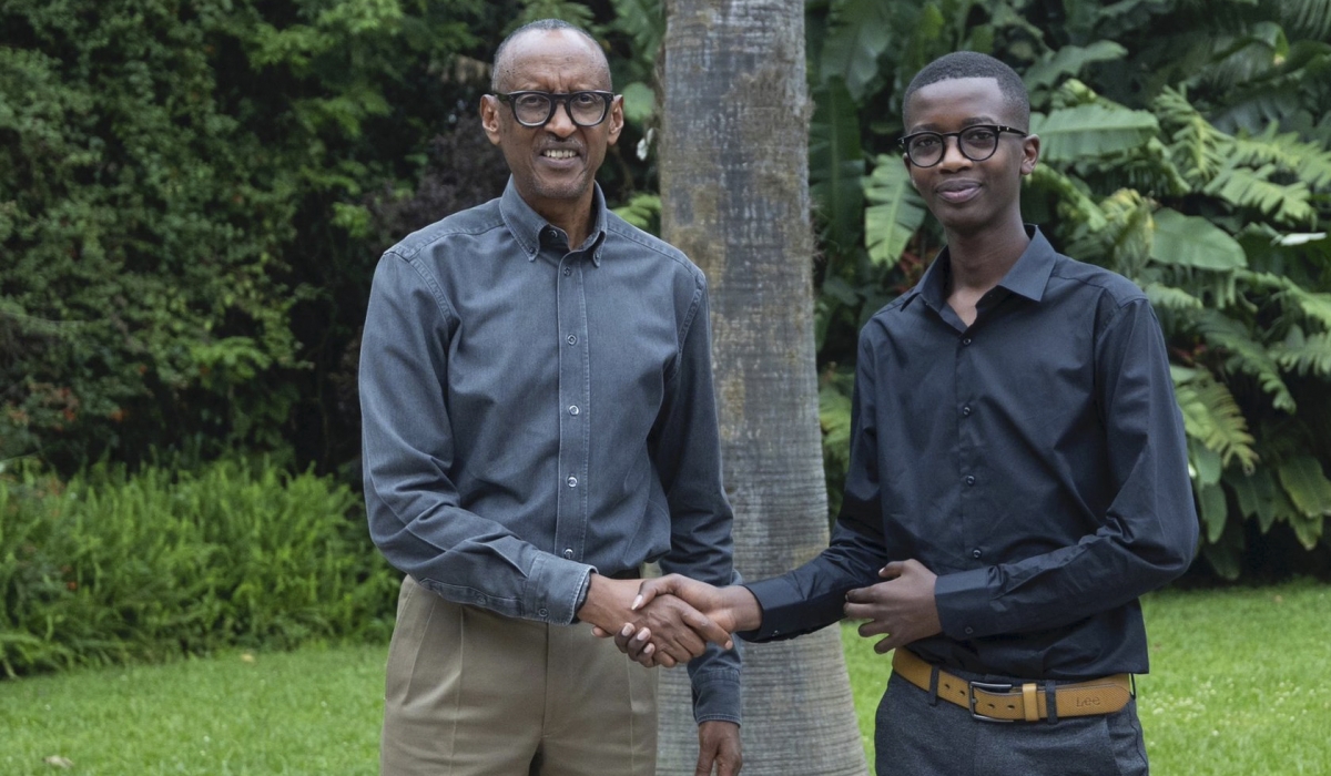 President Paul Kagame congratulates Denys Prince Tuyisenge who won a gold medal in the Pan African Mathematics Olympiad, at Village Urugwiro on Thursday, August 22. Photos by Village Urugwiro