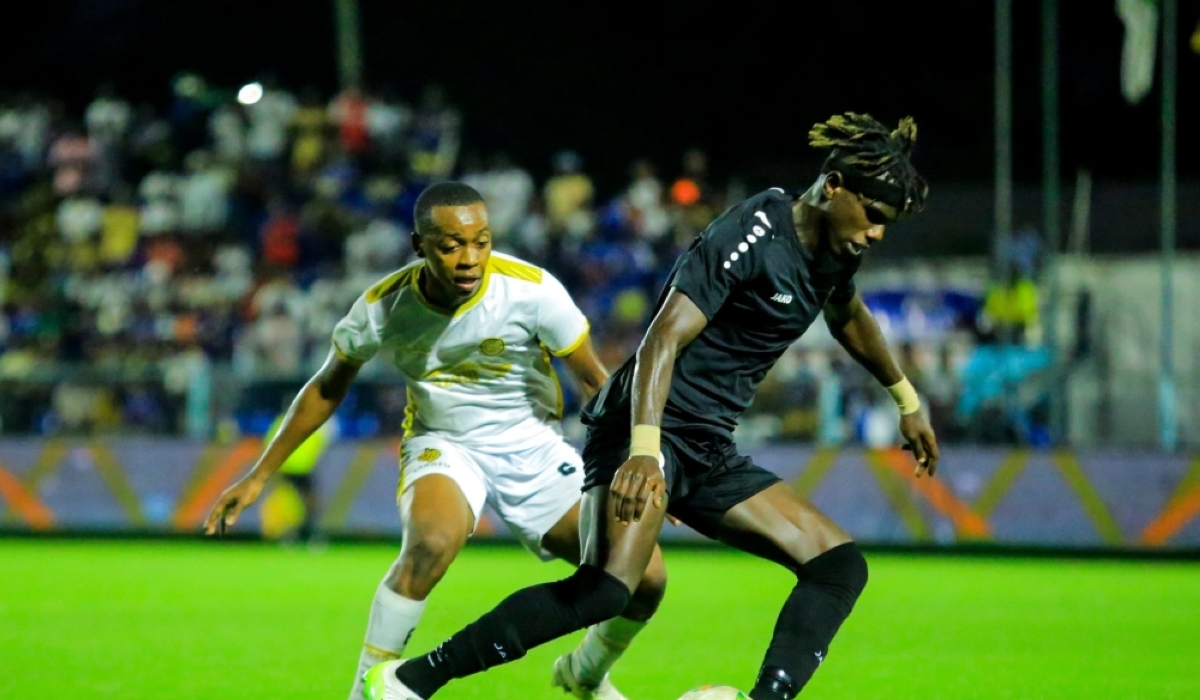 APR FC&#039;s Clement Niyigena  wins the balll against AZAM FC players during 0-1 game in Tanzania on Sunday, August 18. Courtesy