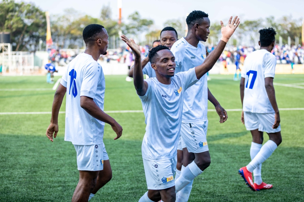 Rayon Sports goal scorer forward Fiston Ishimwe and teammates celebrate the goal during the match held at Kigali Pelé Stadium on Saturday.  Photo by Craish Bahizi