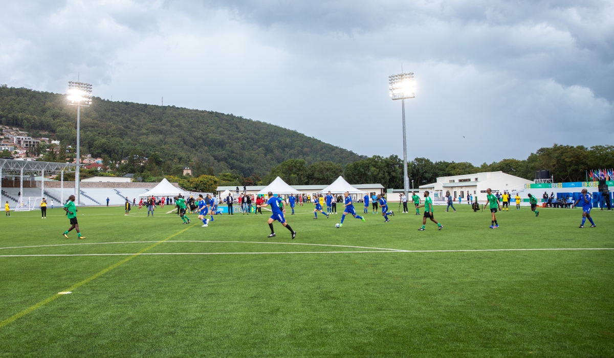 President Paul Kagame (3rd-right) participated in a ceremonial match with global football leaders and legends to officially open then newly renovated and rebranded Kigali Pele Stadium on March 15, 2023. PHOTO BY OLIVIER MUGWIZA