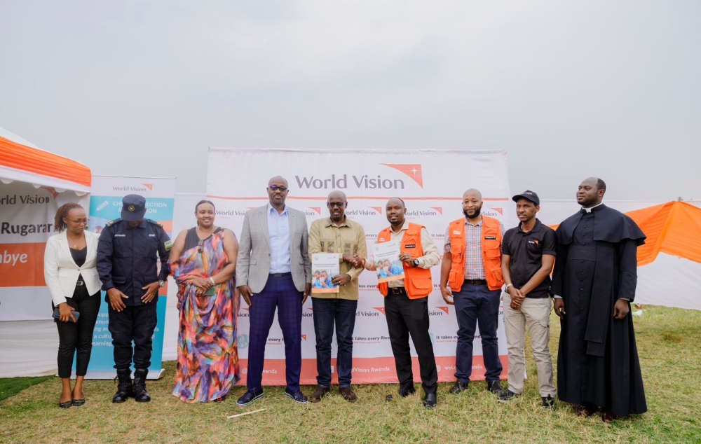 Government officials, World Vision staff during the handover ceremony at Ntende sector in Gatsibo District. Courtesy