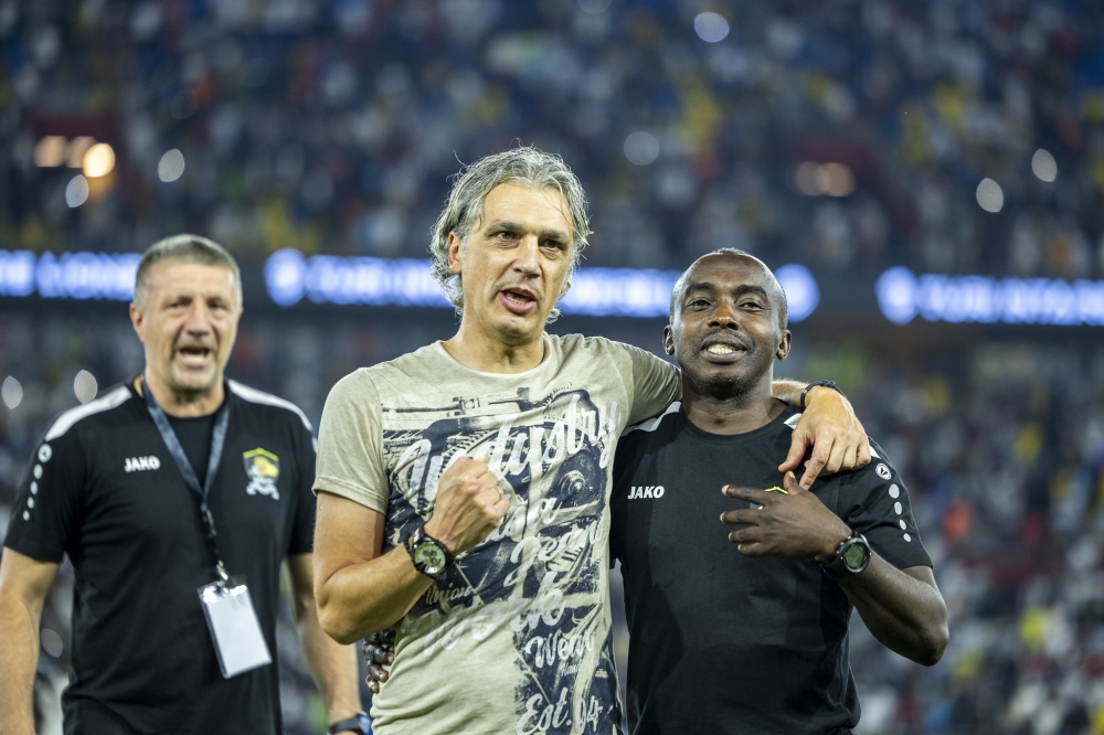 APR FC head coach Darko Novic and staff pose for a photo